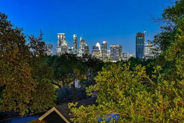 a view of a city with tall buildings