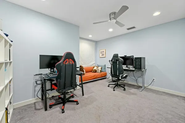 a view of a workspace with furniture