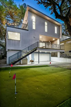 a front view of a house with swimming pool