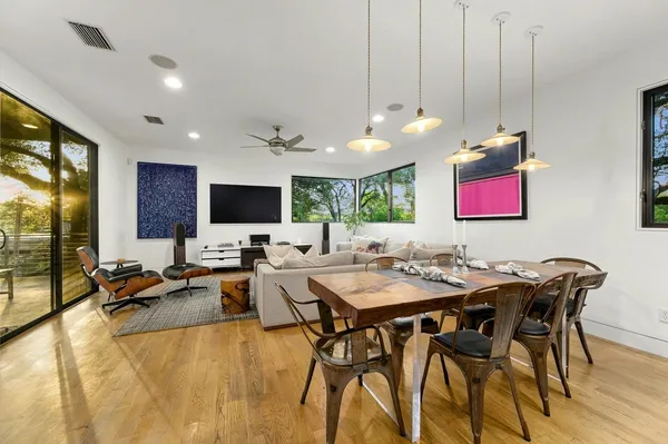 a view of a dining room with furniture window and outside view
