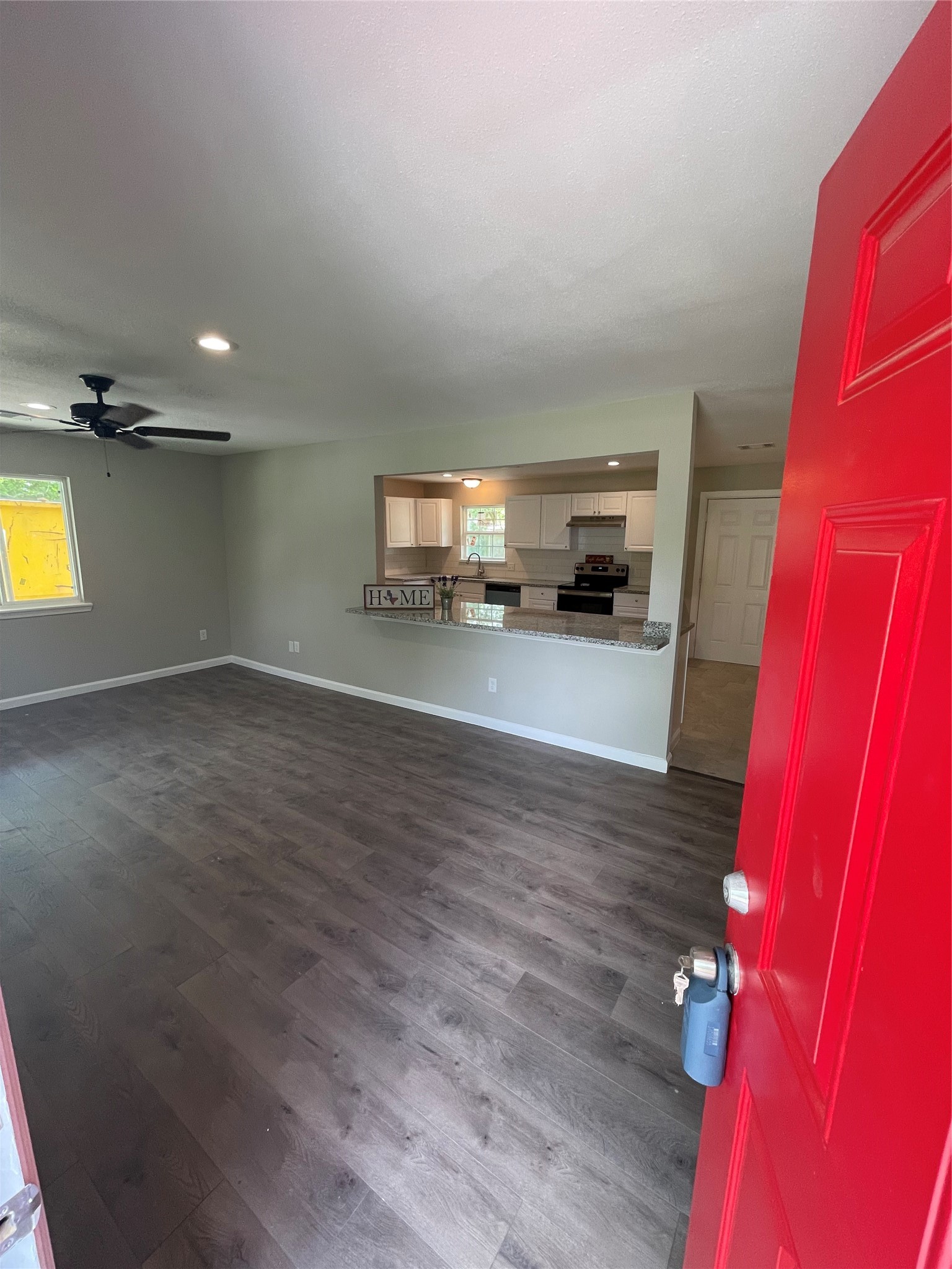 2734 Ash Road Pearland, TX 77584 - Photo 2 of 15 a view of a livingroom with a kitchen