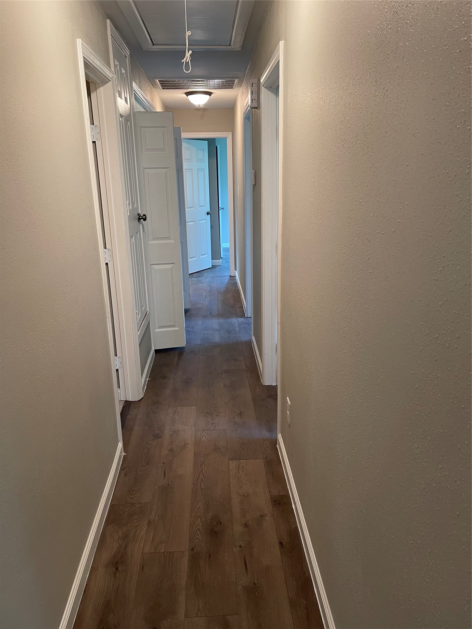 2734 Ash Road Pearland, TX 77584 - Photo 7 of 15 a view of hallway with wooden floor