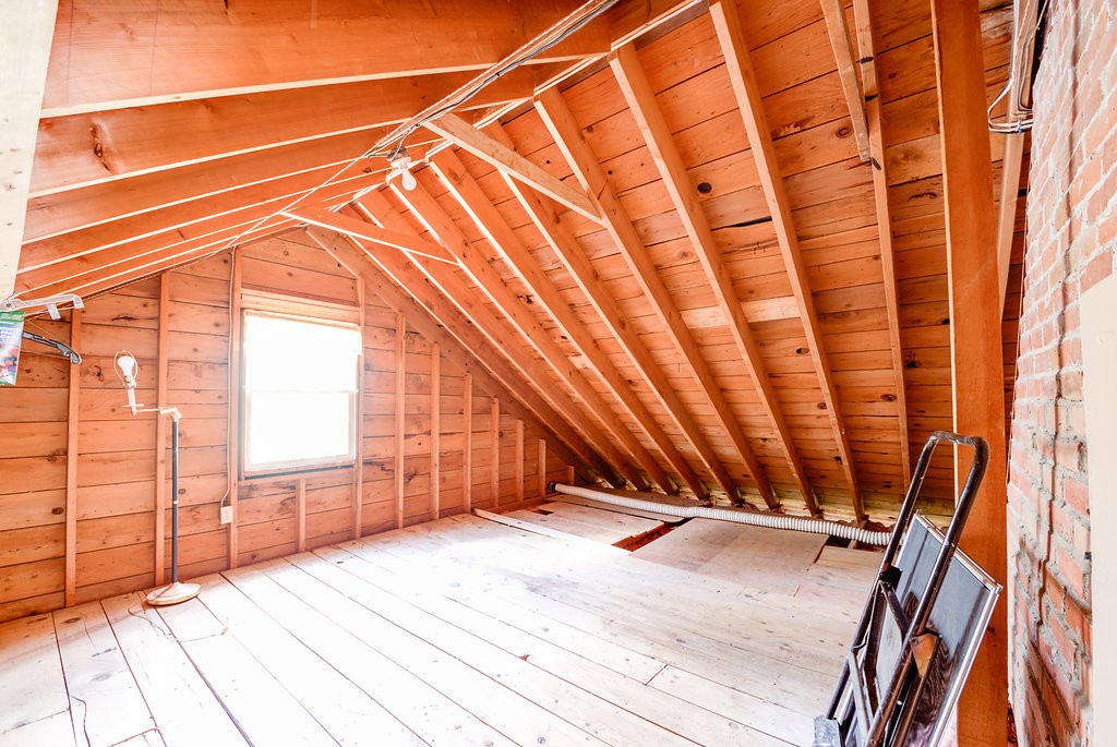 60 Woodcrest Road Boxford, MA 01921 - Photo 17 of 23 a view of a room with wooden floor and windows