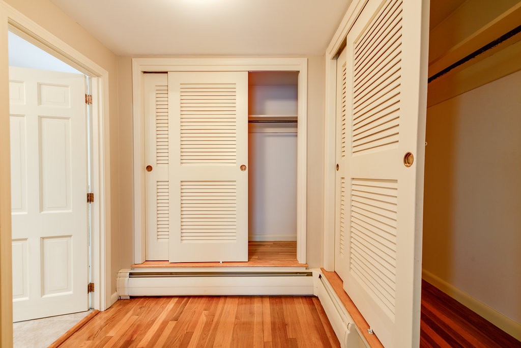 60 Woodcrest Road Boxford, MA 01921 - Photo 10 of 23 a view of a room with wooden floor and window