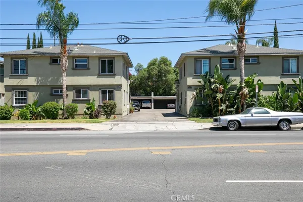 front view of a house with a street