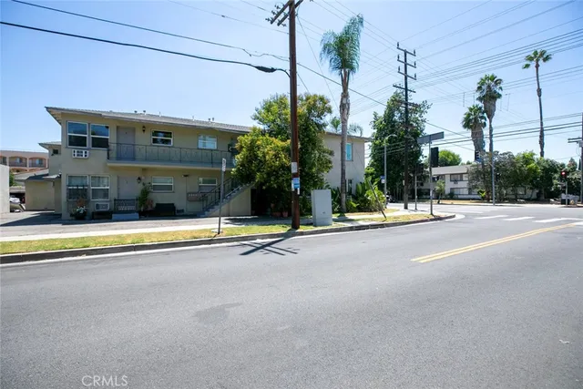 a view of a car parked in front of house
