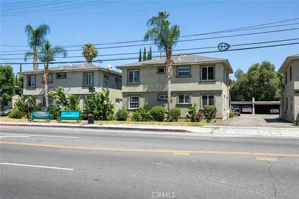 front view of a house with a street