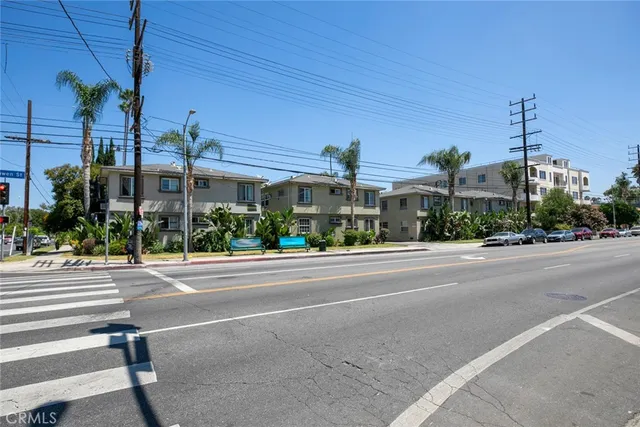 a view of a building with a street