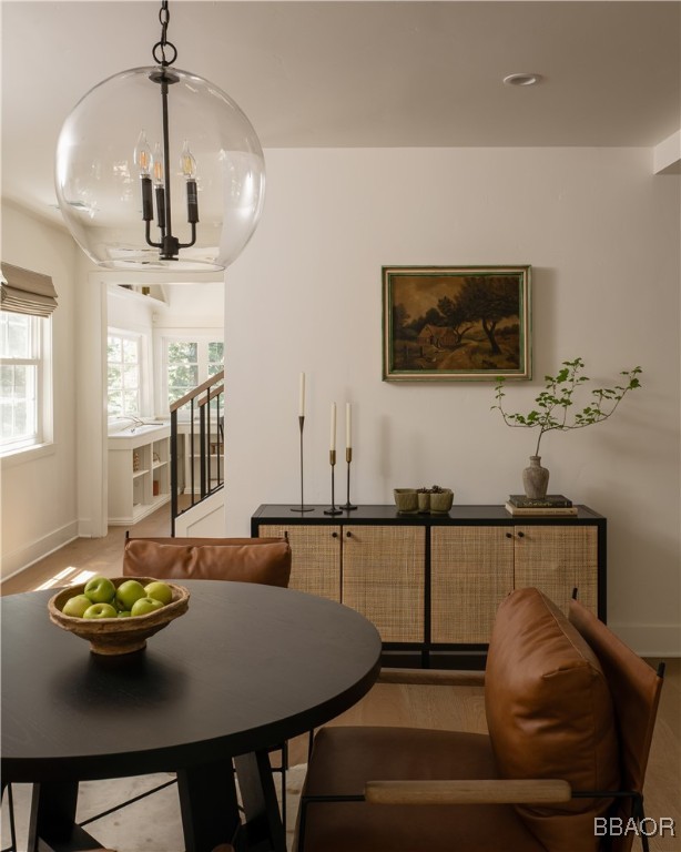 920 Oak Road Lake Arrowhead, CA 92385 - Photo 5 of 28 a dining room with furniture and window