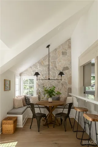 a view of a livingroom with furniture and window