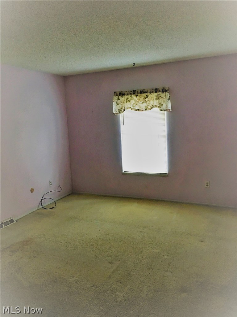 4940 Friar Road, Unit D Stow, OH 44224 - Photo 14 of 23 The larger of the 2 upstairs bedrooms is home to a walk in closet.