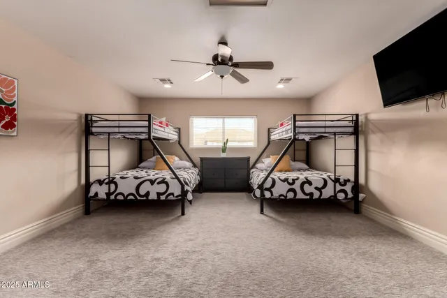 a view of a hallway with workspace and entryway