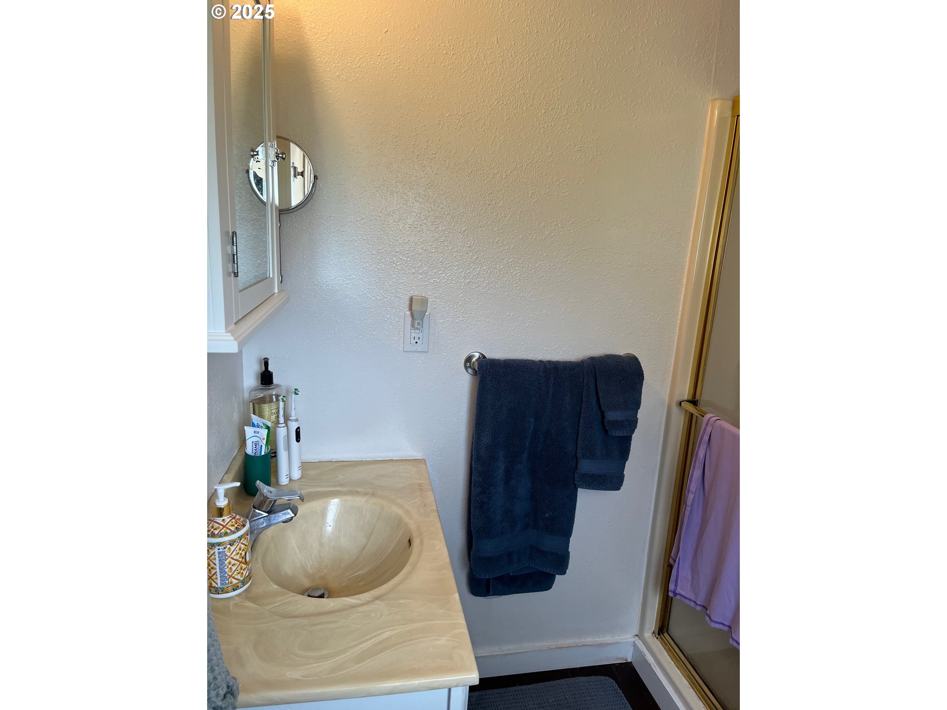 1205 49th Street Seaview, WA 98644 - Photo 13 of 36 a bathroom with a toilet and a sink