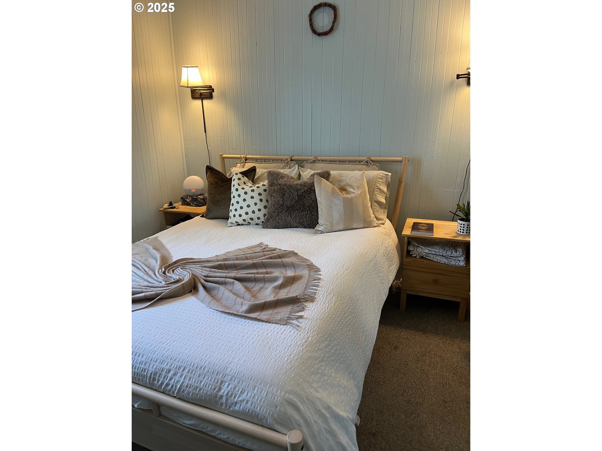 1205 49th Street Seaview, WA 98644 - Photo 20 of 36 a bedroom with a bed and a cabinets