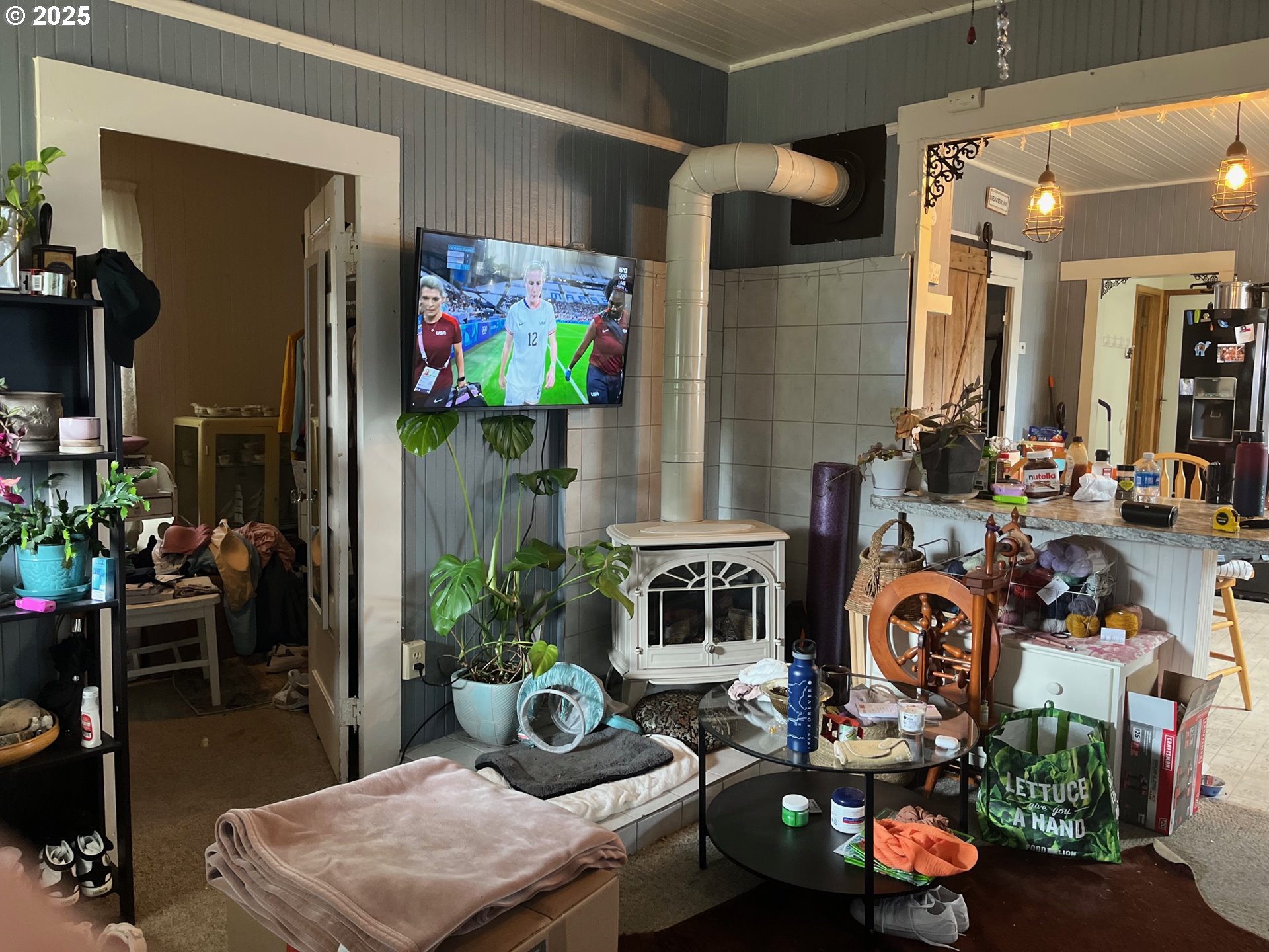 1205 49th Street Seaview, WA 98644 - Photo 22 of 36 a room with lots of furniture and clutter