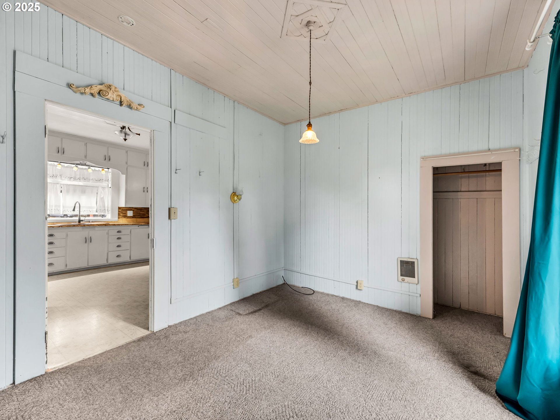 1205 49th Street Seaview, WA 98644 - Photo 27 of 36 a view of a room with a stylish ceiling fan and entryway