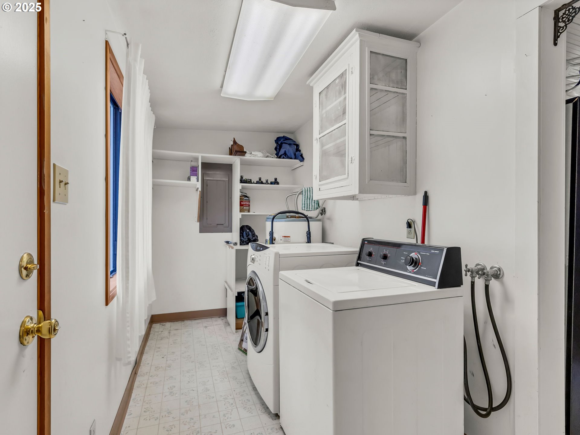 1205 49th Street Seaview, WA 98644 - Photo 33 of 36 a utility room with dryer and washer