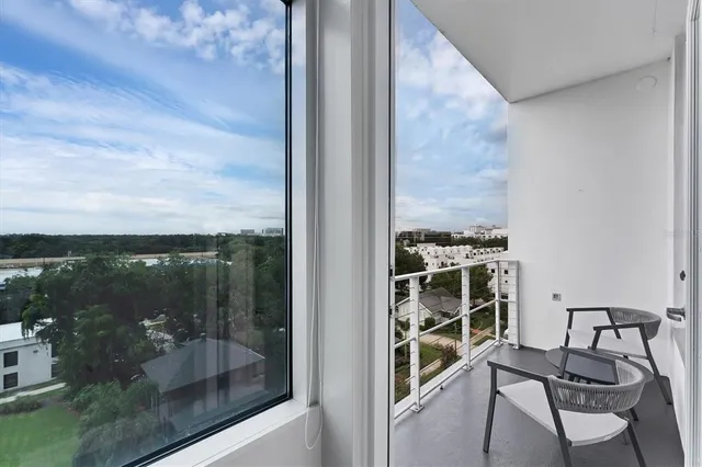 a view of a balcony with chair