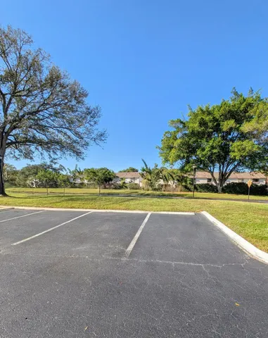a view of a swimming pool and an outdoor space