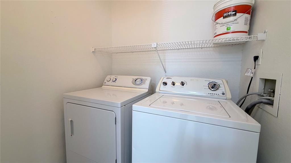 1037 South Hiawassee Road, Unit 2825 Orlando, FL 32835 - Photo 12 of 16 a utility room with dryer and washer