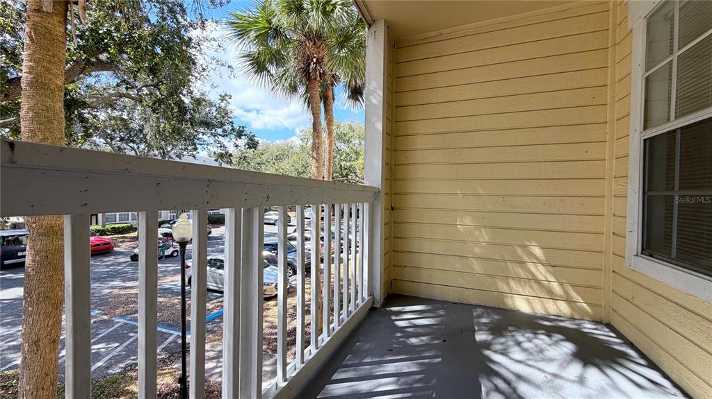1037 South Hiawassee Road, Unit 2825 Orlando, FL 32835 - Photo 5 of 16 a view of a door and a window