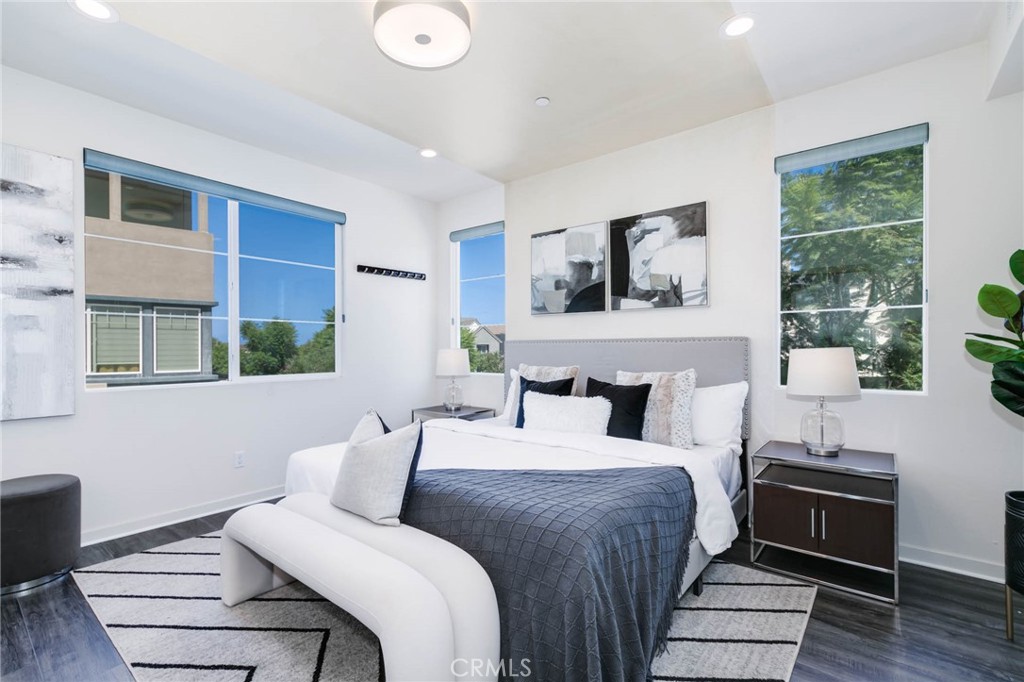 580 Cultivate Irvine, CA 92618 - Photo 12 of 30 a bedroom with a bed and wooden floor