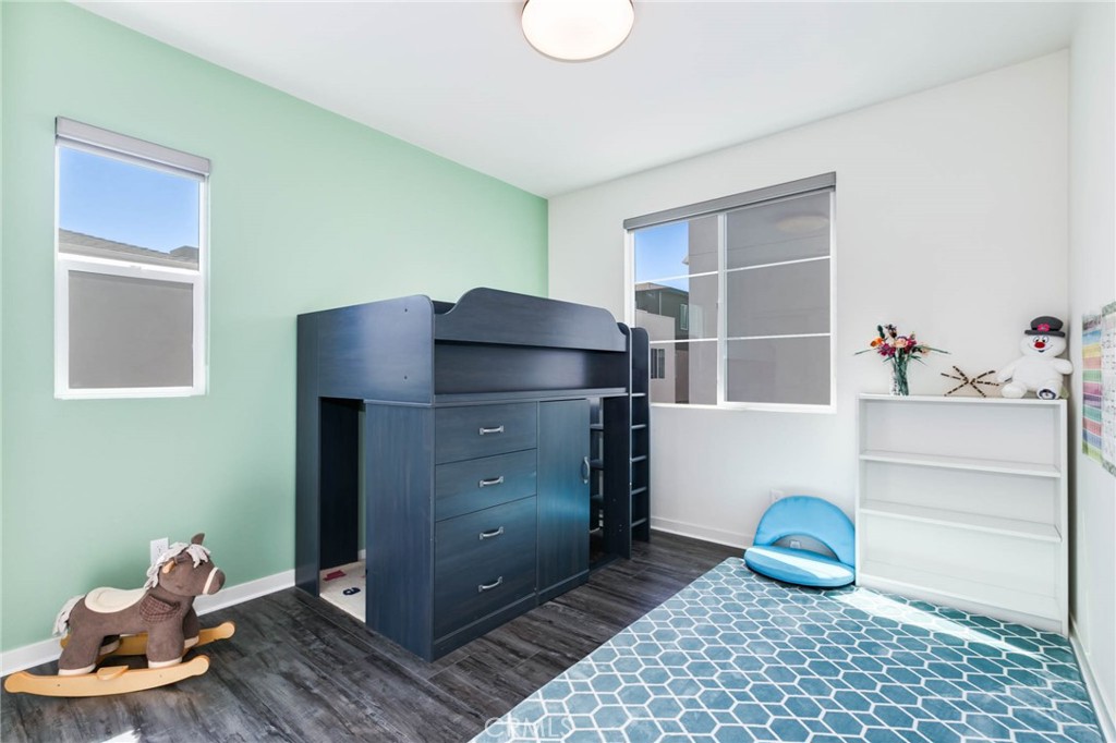 580 Cultivate Irvine, CA 92618 - Photo 18 of 30 a room with a baby crib and a dresser