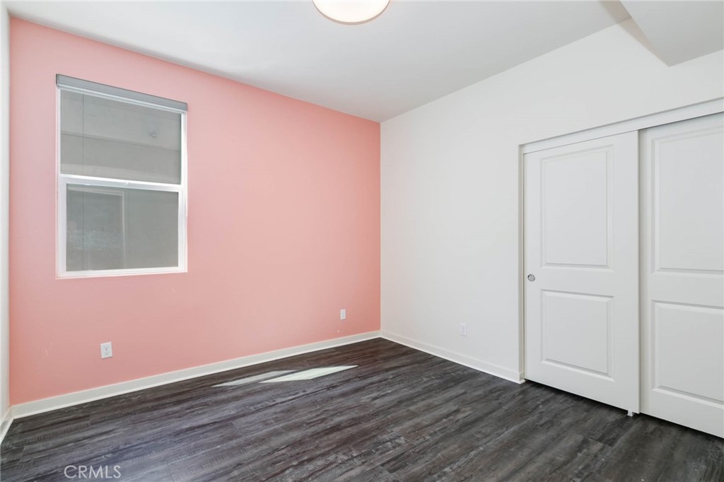 580 Cultivate Irvine, CA 92618 - Photo 19 of 30 a view of an empty room with wooden floor and a window