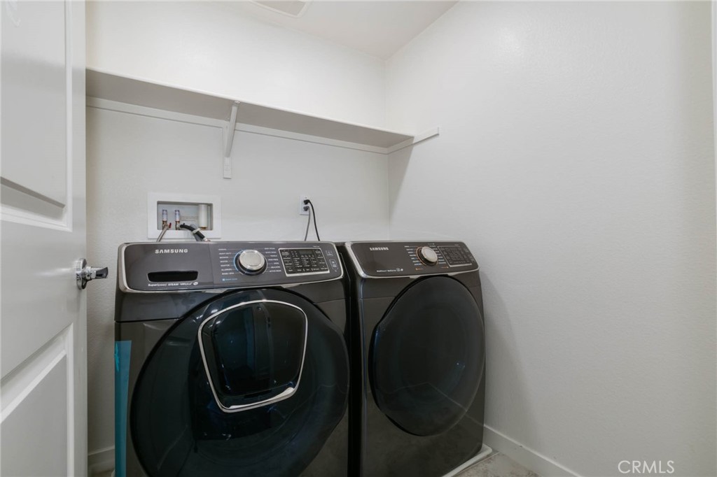 580 Cultivate Irvine, CA 92618 - Photo 23 of 30 a utility room with dryer and washer