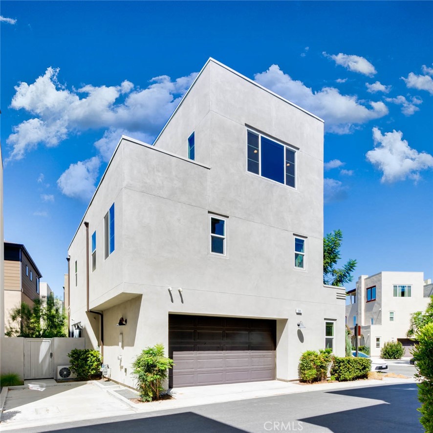 580 Cultivate Irvine, CA 92618 - Photo 3 of 30 a front view of a house with a yard