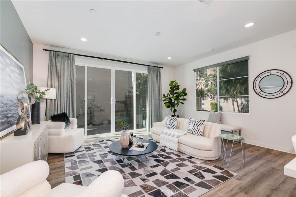 580 Cultivate Irvine, CA 92618 - Photo 8 of 30 a living room with furniture and wooden floor