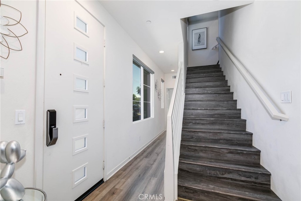580 Cultivate Irvine, CA 92618 - Photo 9 of 30 a view of entryway and hall with wooden floor