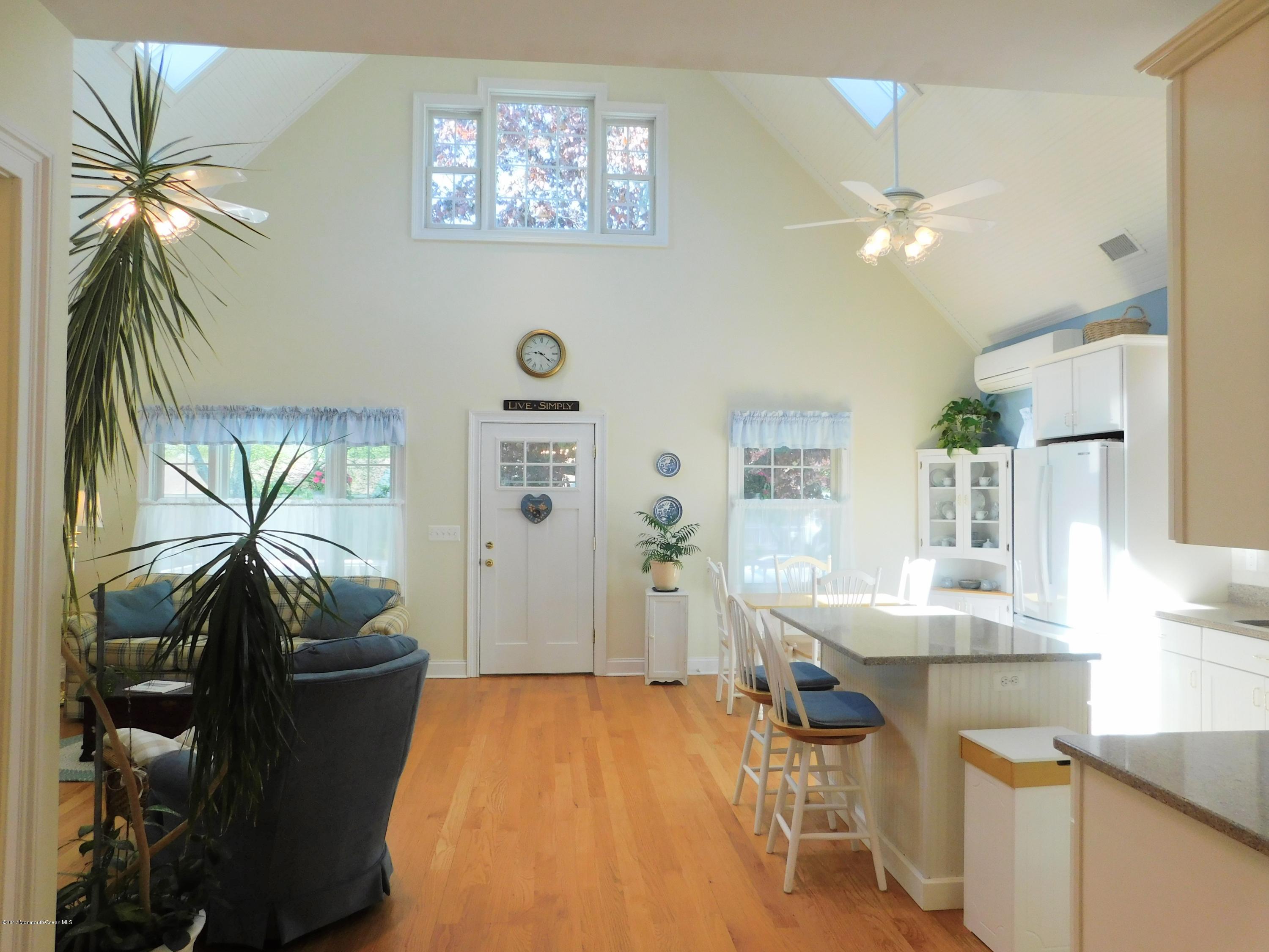 64 Manito Road Manasquan, NJ 08736 - Photo 8 of 26 a workspace with furniture and window