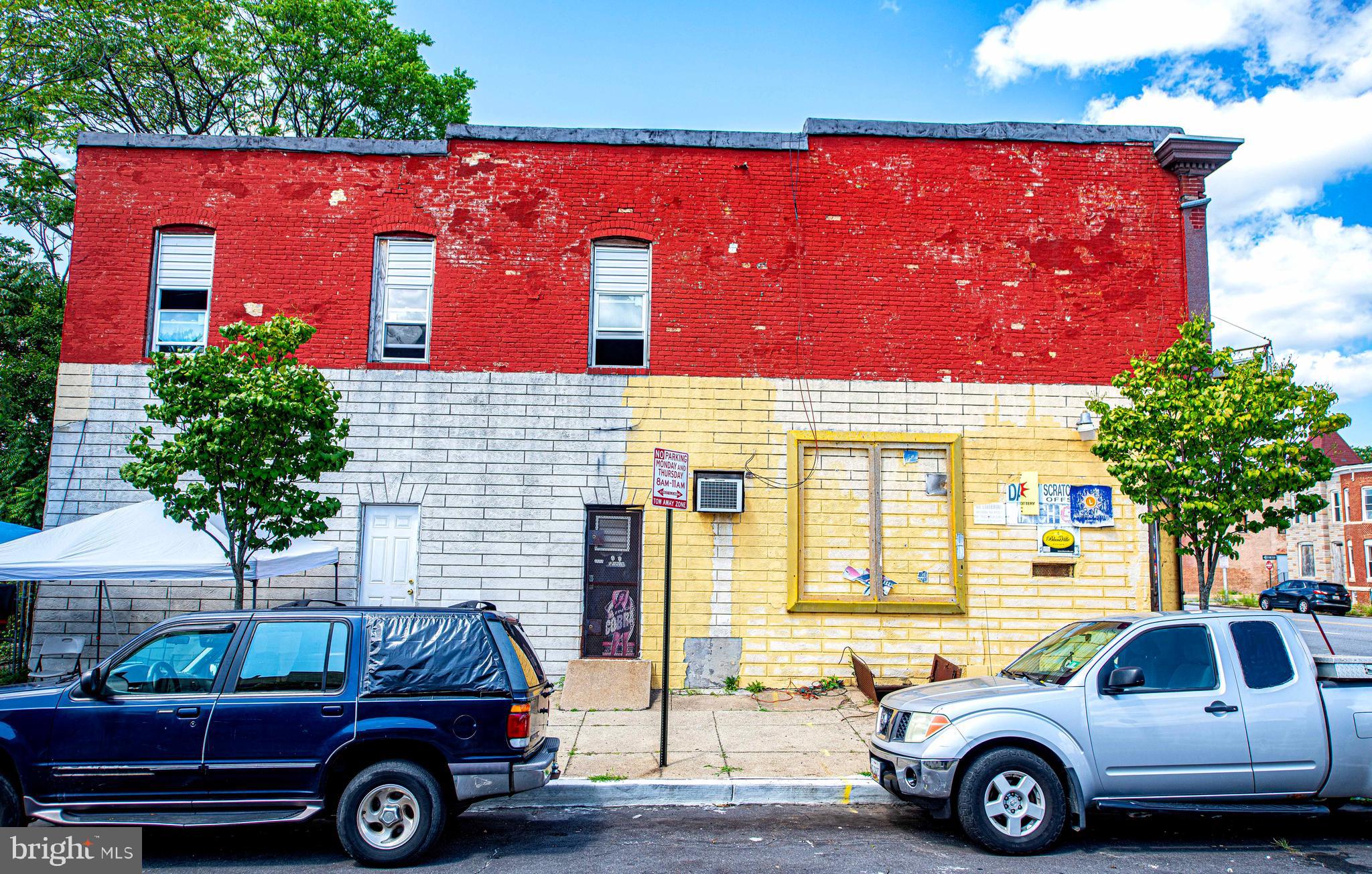 2331 Federal Street Baltimore, MD 21213 - Photo 14 of 15 a car parked in front of a building