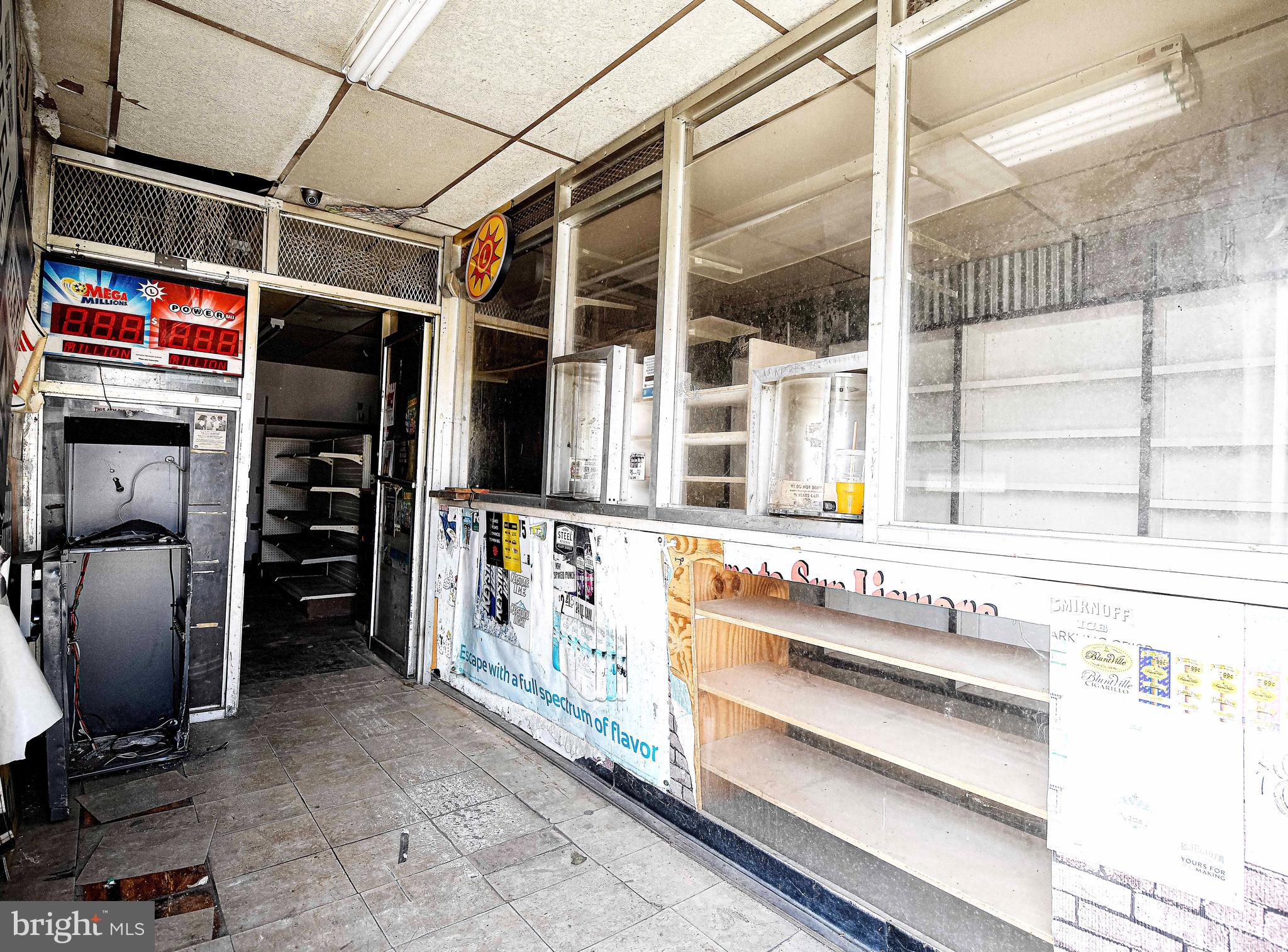 2331 Federal Street Baltimore, MD 21213 - Photo 2 of 15 a storage room with washer and dryer