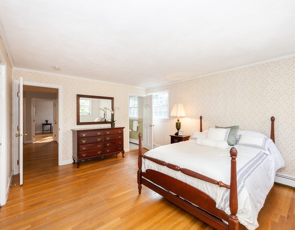 6 Goffe Road Lexington, MA 02421 - Photo 20 of 30 a bedroom with a bed and a dresser