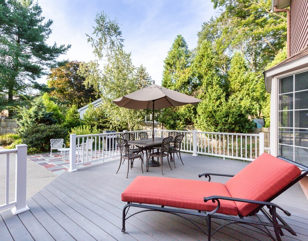 6 Goffe Road Lexington, MA 02421 - Photo 27 of 30 a view of a patio with a table and chairs