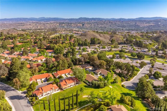 an aerial view of residential house with an outdoor space