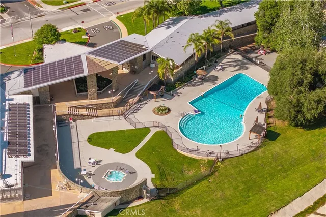 an aerial view of a swimming pool