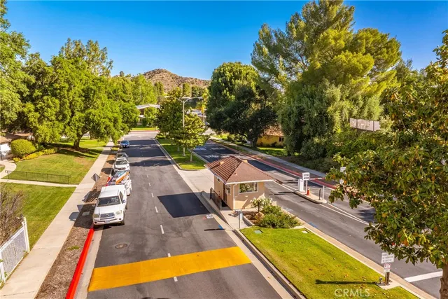 a view of swimming pool with chairs