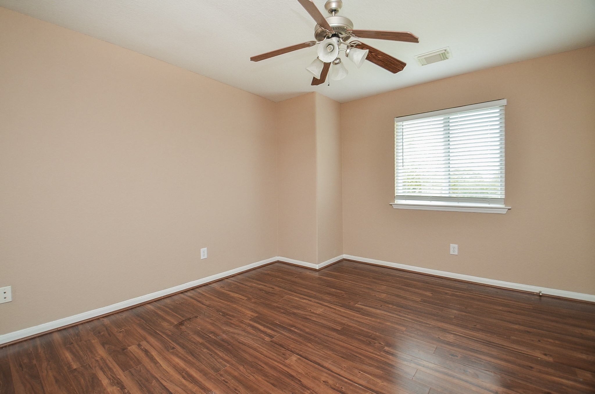 7134 Winston Ranch Parkway Richmond, TX 77406 - Photo 28 of 35 A charming secondary bedroom offers the same serene color and space themes of this special home.
