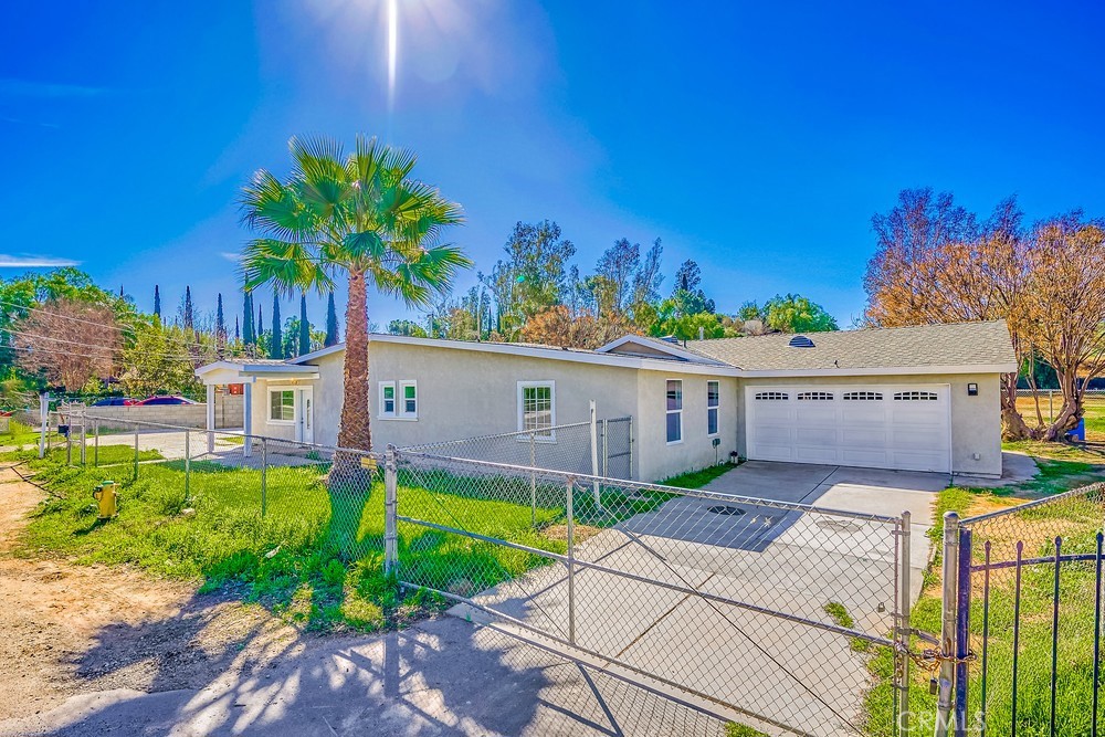 5510 Bushnell Avenue Riverside, CA 92505 - Photo 1 of 23 a front view of a house with garden