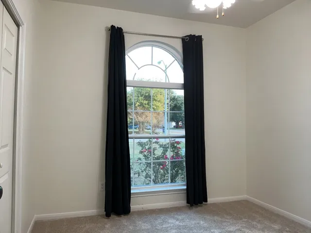 a house with garden in front of it