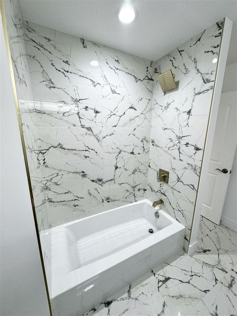 18830 Ruth Drive Mokena, IL 60448 - Photo 16 of 35 a bathroom with a bathtub and shower
