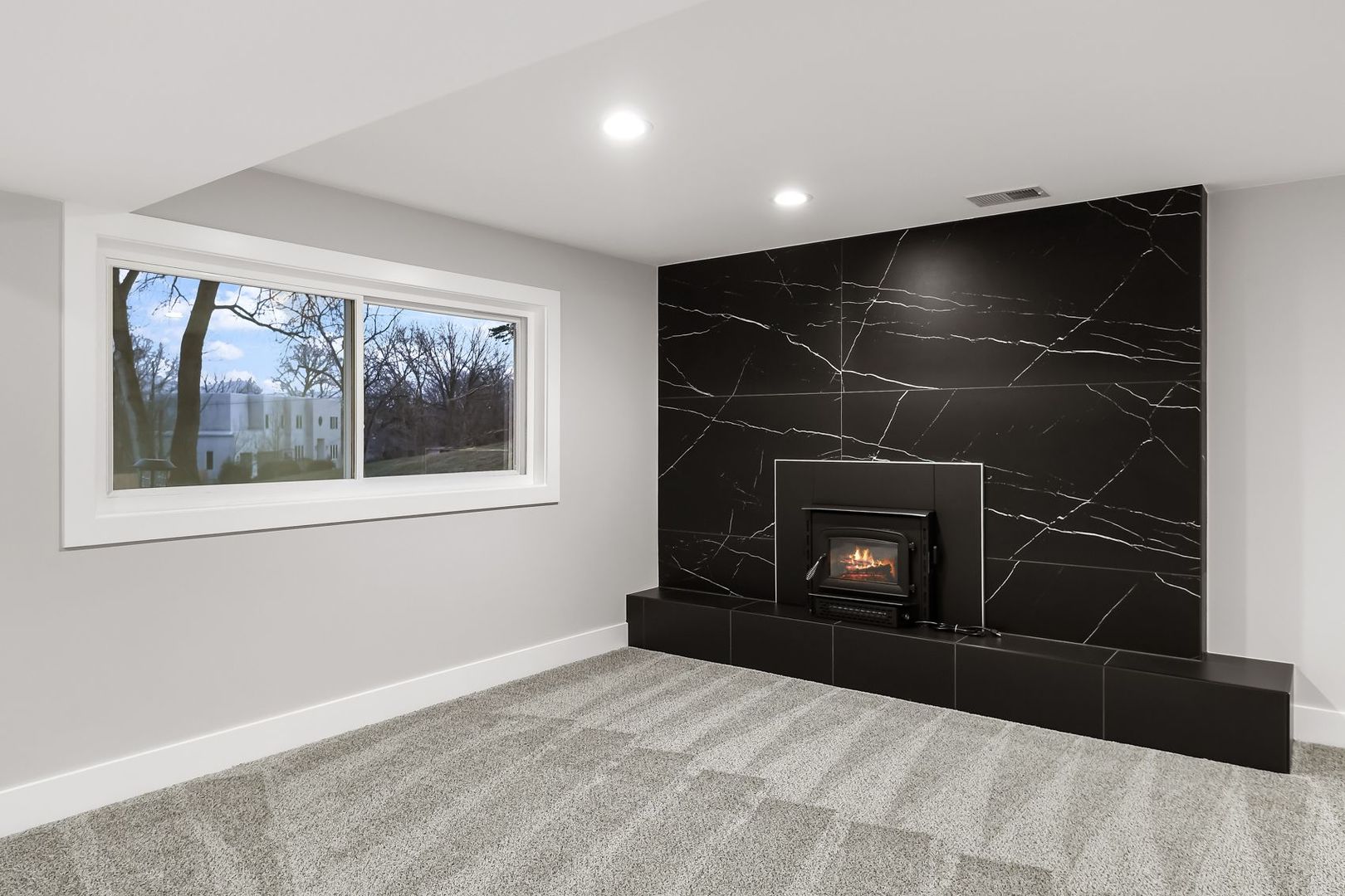 18830 Ruth Drive Mokena, IL 60448 - Photo 20 of 35 a living room with a fireplace and a window