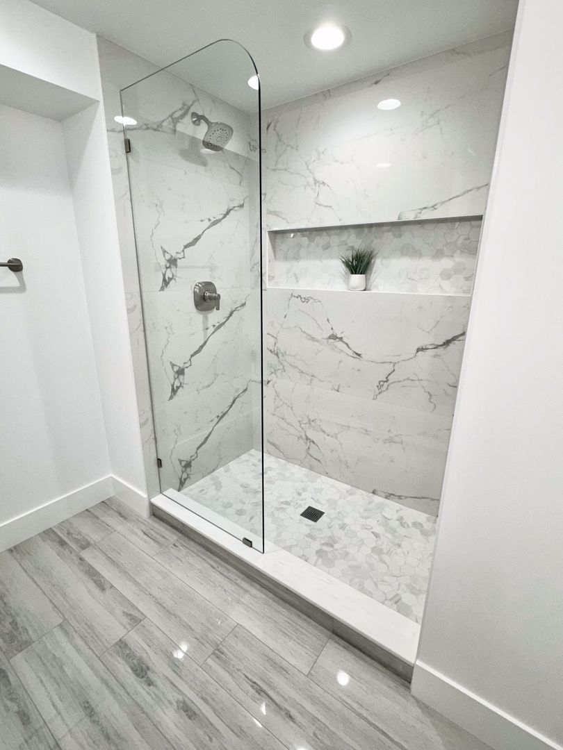 18830 Ruth Drive Mokena, IL 60448 - Photo 27 of 35 a bathroom with a glass shower door