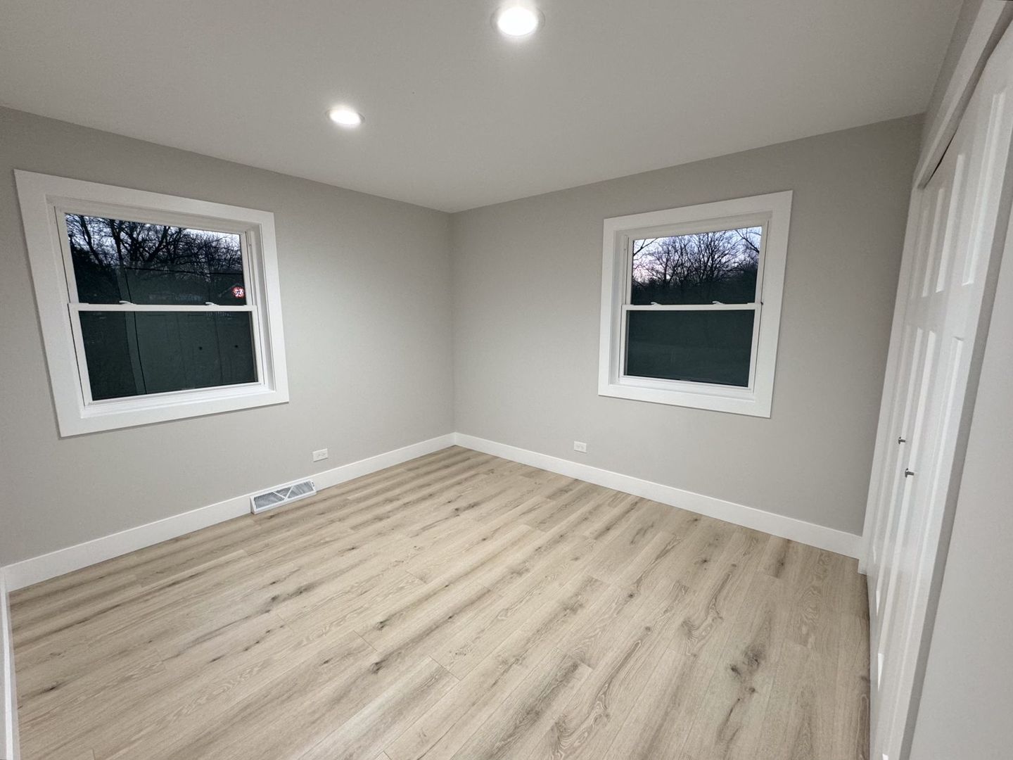 18830 Ruth Drive Mokena, IL 60448 - Photo 10 of 35 a view of empty room with wooden floor and fan