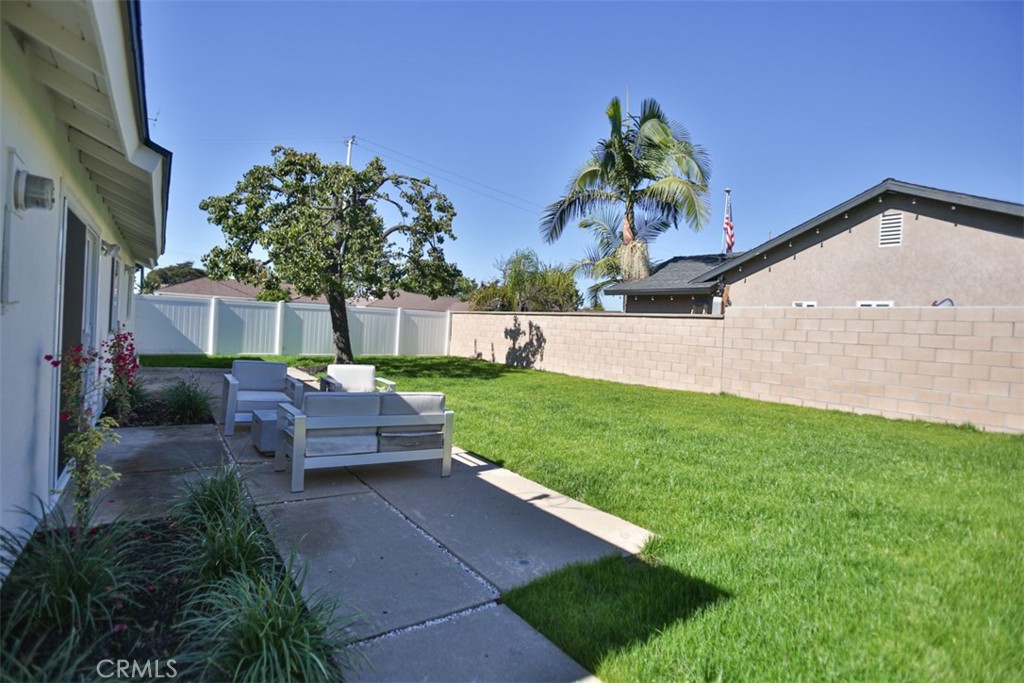 6401 Royal Oak Drive Huntington Beach, CA 92647 - Photo 12 of 49 a view of a backyard with sitting area