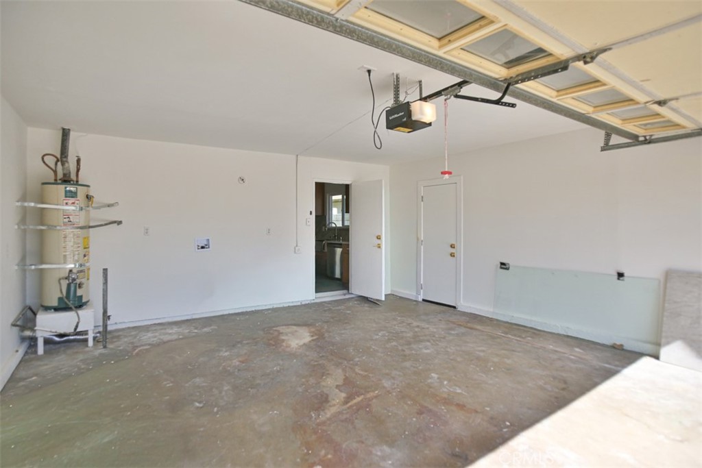 6401 Royal Oak Drive Huntington Beach, CA 92647 - Photo 49 of 49 a view of a livingroom with a ceiling fan & entryway