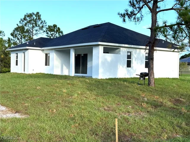 a house view with a garden space